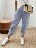 Blue lightweight summer women's trousers with straight leg fit and drawstring waistband by FJØRNA.