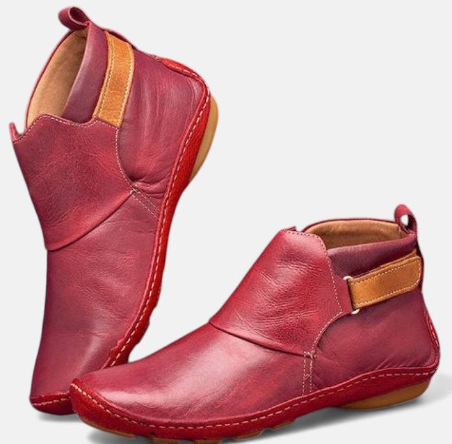 FJØRNA women's orthopedic ankle boots in breathable leather, featuring a stylish city flair design.
