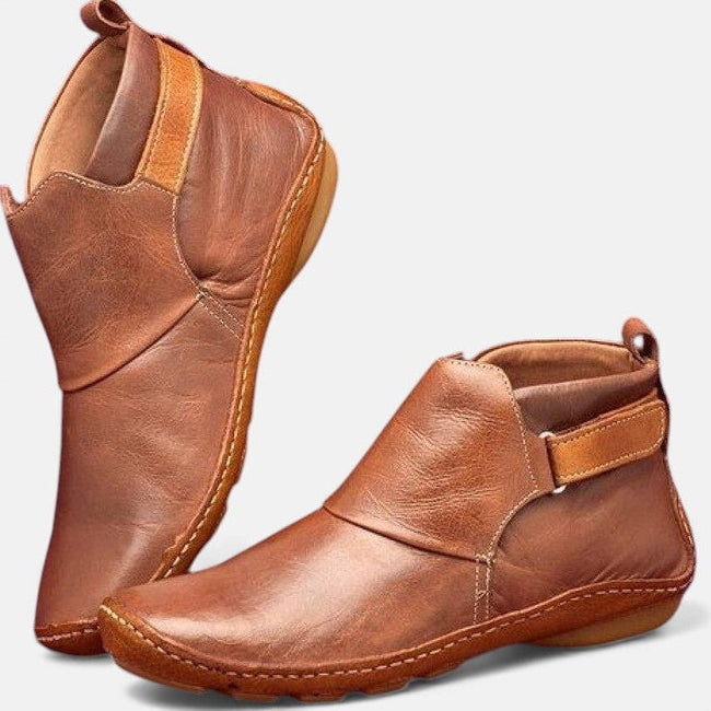 FJØRNA women's orthopedic ankle boots in breathable leather, featuring a stylish city flair design and supportive sole for comfort