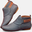 FJØRNA women's orthopedic ankle boots made of breathable leather featuring a stylish city flair design.