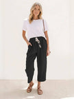 FJØRNA linen summer trousers for women with a relaxed straight-leg fit and drawstring waist, ideal for breezy, comfortable style