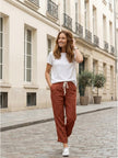 FJØRNA women's linen summer trousers with a relaxed fit, straight leg style and drawstring waist, ideal for warm-weather wear.