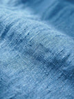 FJØRNA women's linen summer trousers with a relaxed straight-leg fit and drawstring waist, perfect for warm weather.