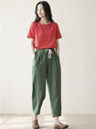 FJØRNA linen summer trousers for women with a relaxed, straight-leg fit and drawstring waist, ideal for warm-weather wear.