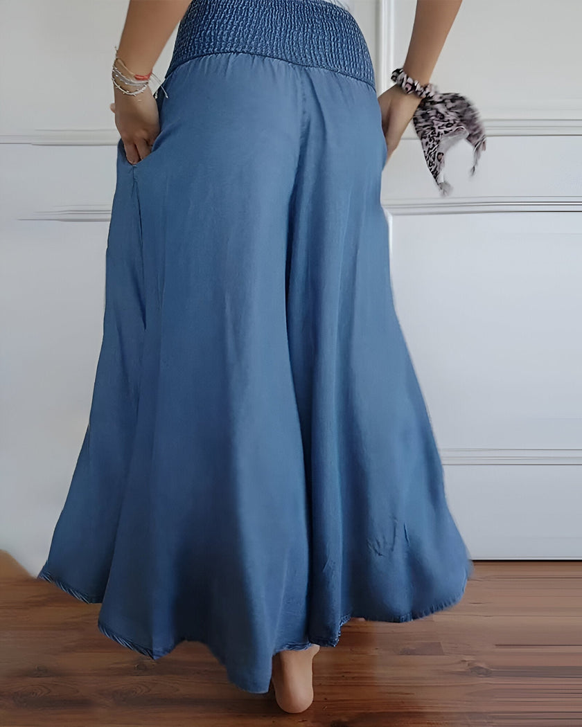 FJØRNA lightweight summer dress for women with elastic waist, breathable fabric, perfect for warm weather.