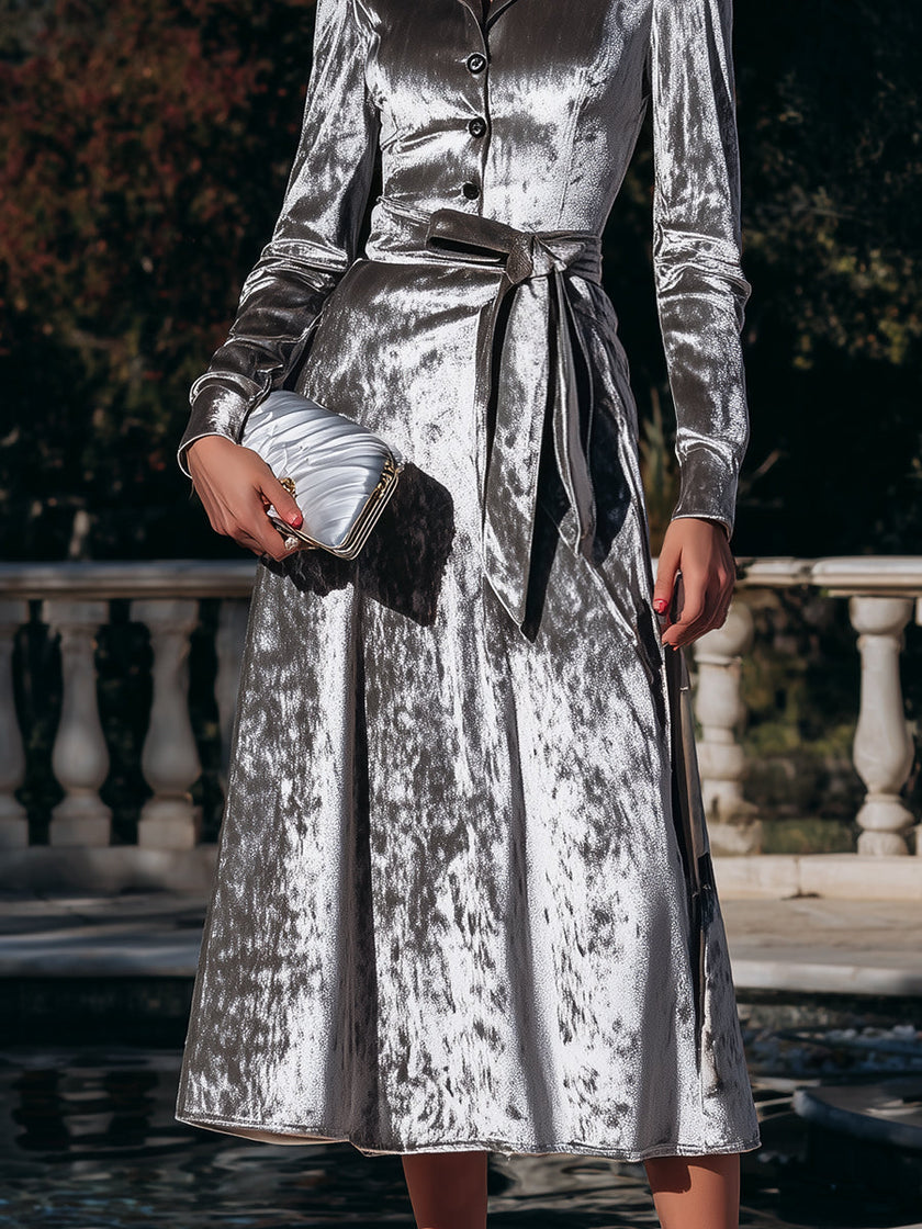 FJØRNA button-front belted midi coat dress for women, stylish and warm with a classic design, shown on a model.