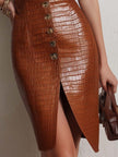 FJØRNA caramel croc-embossed faux leather midi dress with a fitted silhouette and stylish details, perfect for a chic look.
