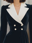 FJØRNA black velvet contrast-lapel tuxedo blazer mini dress with fitted silhouette and sleek lapel detailing.