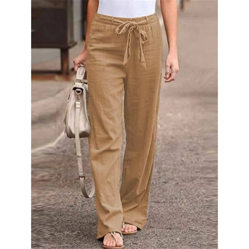 Lightweight women's summer trousers by FJØRNA featuring wide-leg design and drawstring waist, perfect for casual warm-weather wear.
