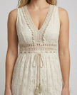 Close-up of FJØRNA women's elegant floral maxi dress with V-neck and sleeveless design, showcasing delicate fabric details.