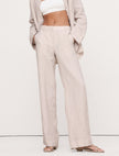 FJØRNA linen wide-leg women's trousers with drawstring pull-on design, lightweight and comfortable for casual wear.
