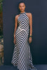 FJØRNA Mono Fluid Stripe Maxi Halter Dress in white, featuring a flowy design and halter neckline, perfect for summer occasions.