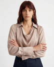 White satin cowl-neck long-sleeve blouse for women by FJØRNA, featuring a stylish and elegant top with a smooth satin finish.