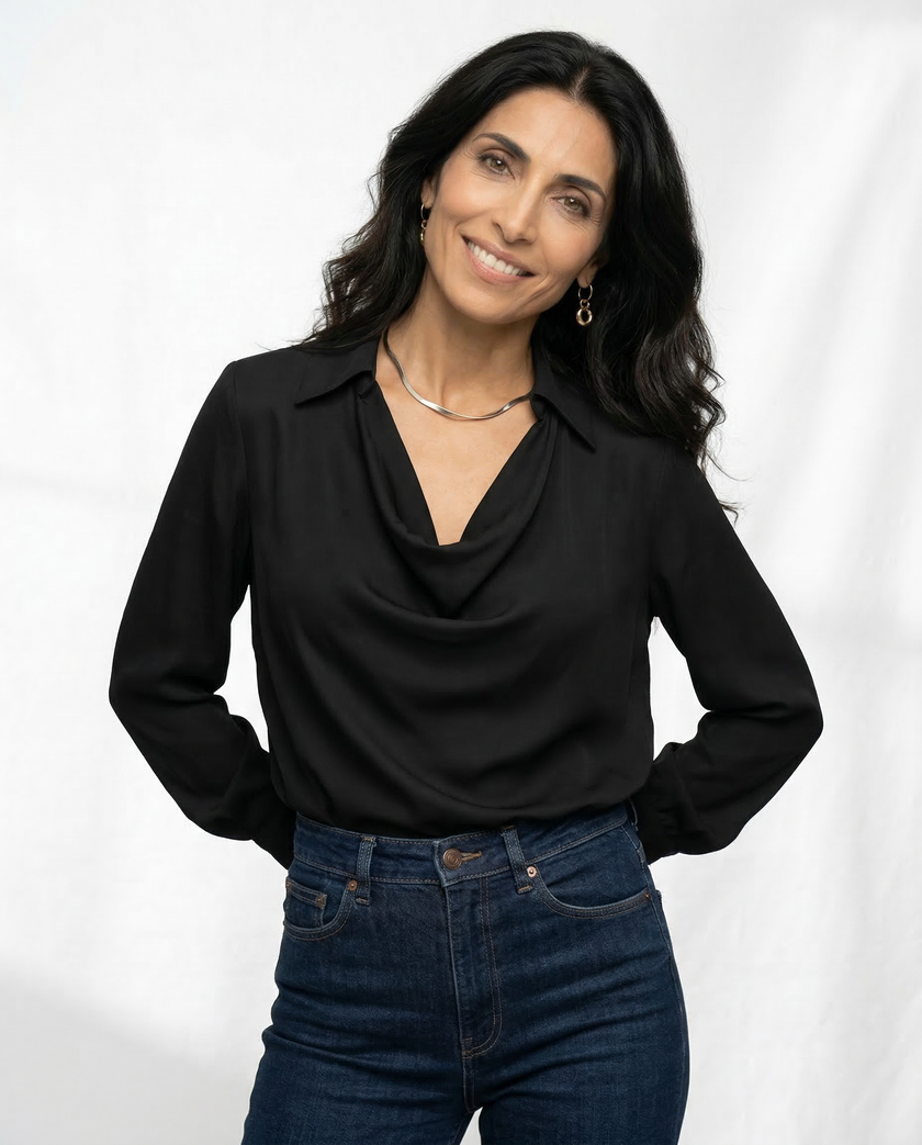 White satin cowl-neck long-sleeve blouse for women by FJØRNA, featuring a smooth fabric and elegant draped neckline.