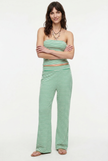 Women's knit wide-leg trousers by FJØRNA, loose pull-on pants with a relaxed fit, featuring a comfortable and stylish design.