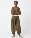 FJØRNA women's linen tapered trousers, stylish and comfortable pants with a relaxed fit, perfect for casual or office wear.