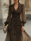 FJØRNA leopard print wrap midi dress with long sleeves, stylish and fitted, perfect for a chic, animal print fashion look.
