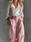 Pink cotton linen wide-leg women's dungarees by FJØRNA, featuring relaxed fit and casual style in a bright, breathable fabric.