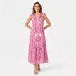 Women's sleeveless floral print boho maxi dress with tie neck from FJØRNA, featuring a flowing silhouette and vibrant pattern.