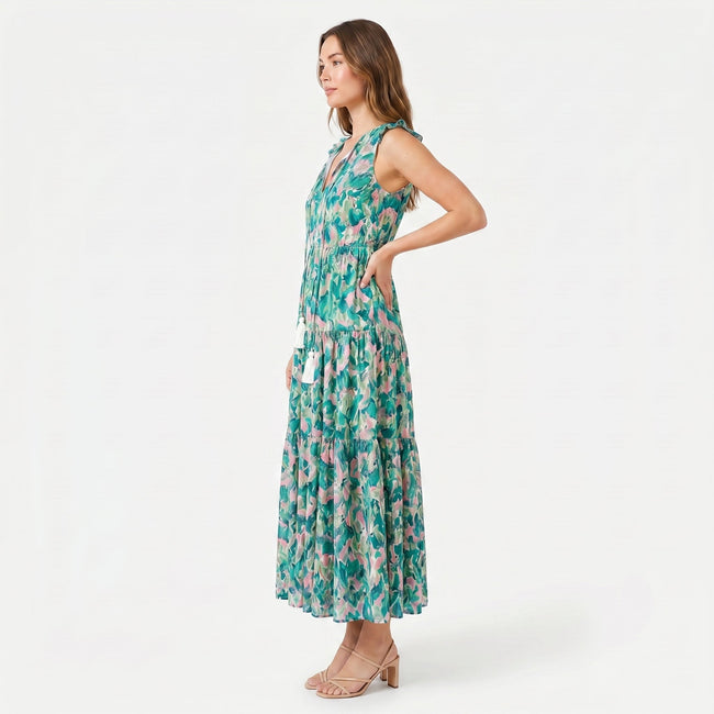 Women's sleeveless floral print boho maxi dress by FJØRNA with tie neck and flowy silhouette, perfect for summer or casual wear.