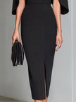 FJØRNA black cape-sleeve midi sheath dress, elegant cocktail dress with flowing cape sleeves and fitted silhouette.