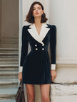 FJØRNA black velvet contrast-lapel blazer mini dress, tuxedo-inspired dress with fitted silhouette and sleek lapel details.