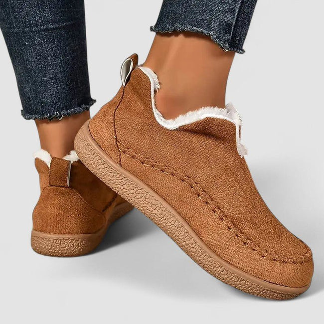 FJØRNA women's orthopedic slip-on shoes with zip-up design, heeled arch support, and comfortable fit for supportive footwear.