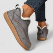 FJØRNA women's orthopedic slip-on shoes with zip-up design, heeled arch support, and supportive sole for comfortable walking.