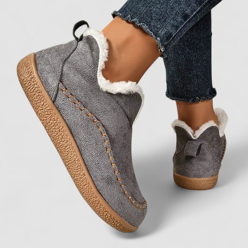 FJØRNA women's orthopedic slip-on shoes with zip-up design, heeled arch support, and supportive sole for comfortable walking.