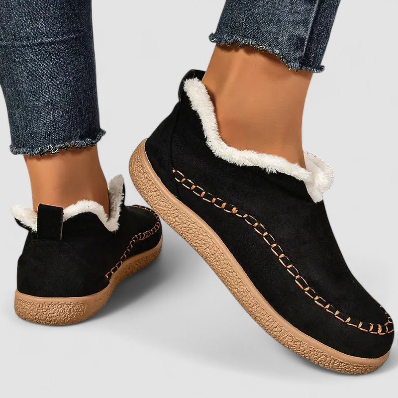 FJØRNA women's orthopedic slip-on shoes with zip-up design and heeled arch support, providing comfort and support.