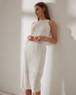 Red FJØRNA pearl-strap textured midi dress with water ripple pattern, elegant women’s dress perfect for stylish occasions.