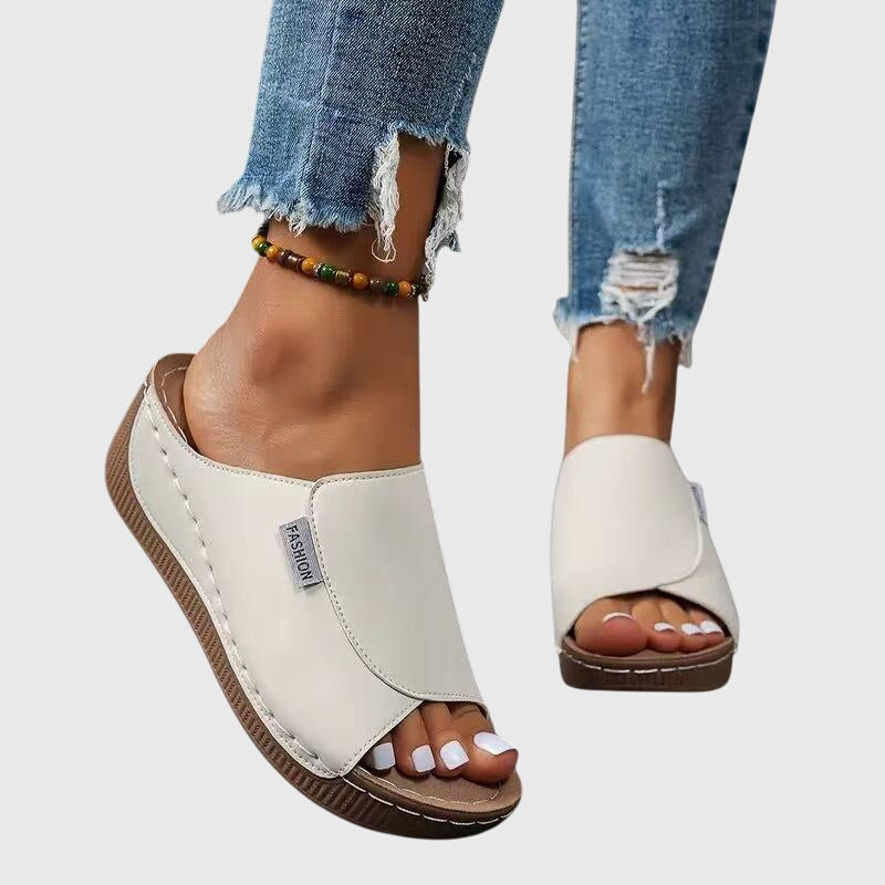 FJØRNA women's orthopedic sandals with arch support, summer footwear featuring cushioned straps and a supportive sole.