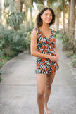Women's FJØRNA summer tankini set with ruffles and V-neck, featuring a stylish two-piece swimwear design for beach or pool.