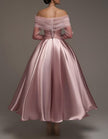Pink satin midi dress for women by FJØRNA, strapless A-line design with shawl and strappy details, elegant evening wear.