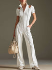 White cotton blend short sleeve wide-leg jumpsuit for women by FJØRNA, featuring a relaxed fit and stylish design.