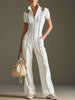 White cotton blend short sleeve wide-leg jumpsuit for women by FJØRNA, featuring a relaxed fit and stylish design.