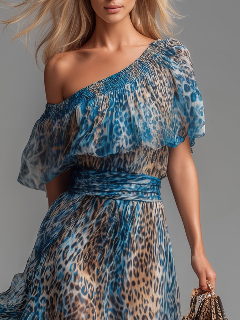 FJØRNA chiffon off-shoulder maxi dress for evening occasions, flowing fabric and elegant design visible in the image.