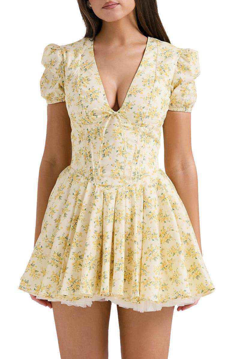 FJØRNA Emily Floral V-neck Corset Mini Dress in white, featuring a fitted bodice and floral pattern, perfect for summer occasions.