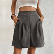 FJØRNA women's lightweight summer shorts with wide leg and high waist, shown in a natural fabric and relaxed fit style.