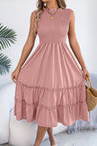 FJØRNA sleeveless midi dress with patchwork design, solid color, and tucked details, perfect for casual occasions.