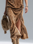 FJØRNA leopard print sleeveless vest and velvet split-hem skirt set, stylish women's pants ensemble with bold animal print and luxurious fabric