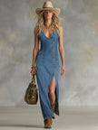 FJØRNA denim V-neck maxi dress with button details, flowing fabric, and sleeveless design for women.