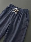 FJØRNA women's lightweight summer trousers with a drawstring waist and breathable fabric, casual and comfortable for warm weather.