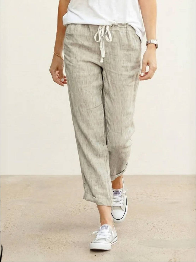 FJØRNA women's lightweight summer trousers with drawstring, breathable casual pants for comfortable warm-weather wear.