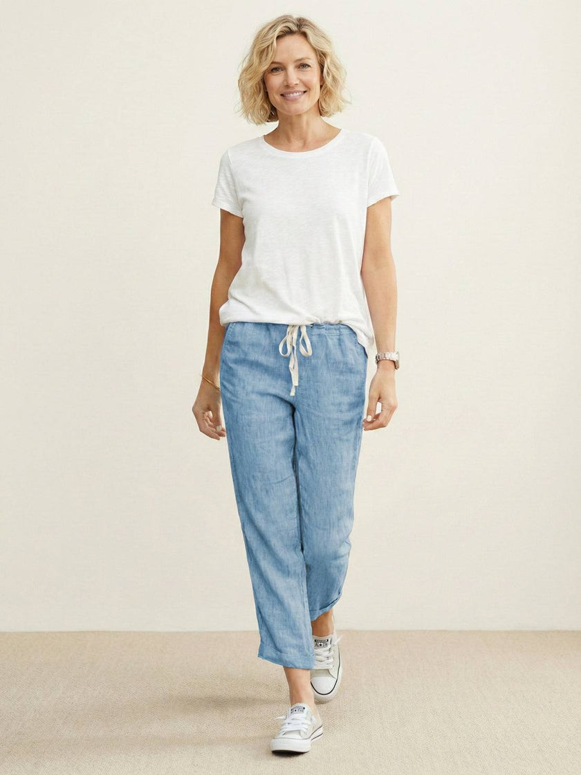 FJØRNA lightweight summer women's trousers with drawstring waist, breathable casual pants for warm weather.