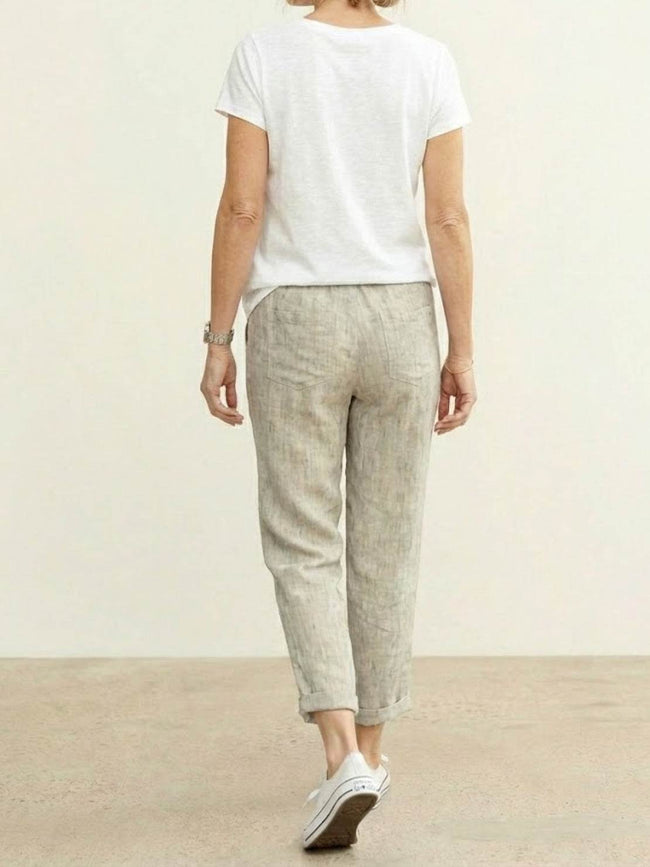 FJØRNA women's lightweight summer trousers with drawstring waist, breathable casual pants for warm weather.