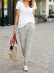 FJØRNA women's lightweight summer trousers with drawstring waist, breathable casual pants for warm weather.