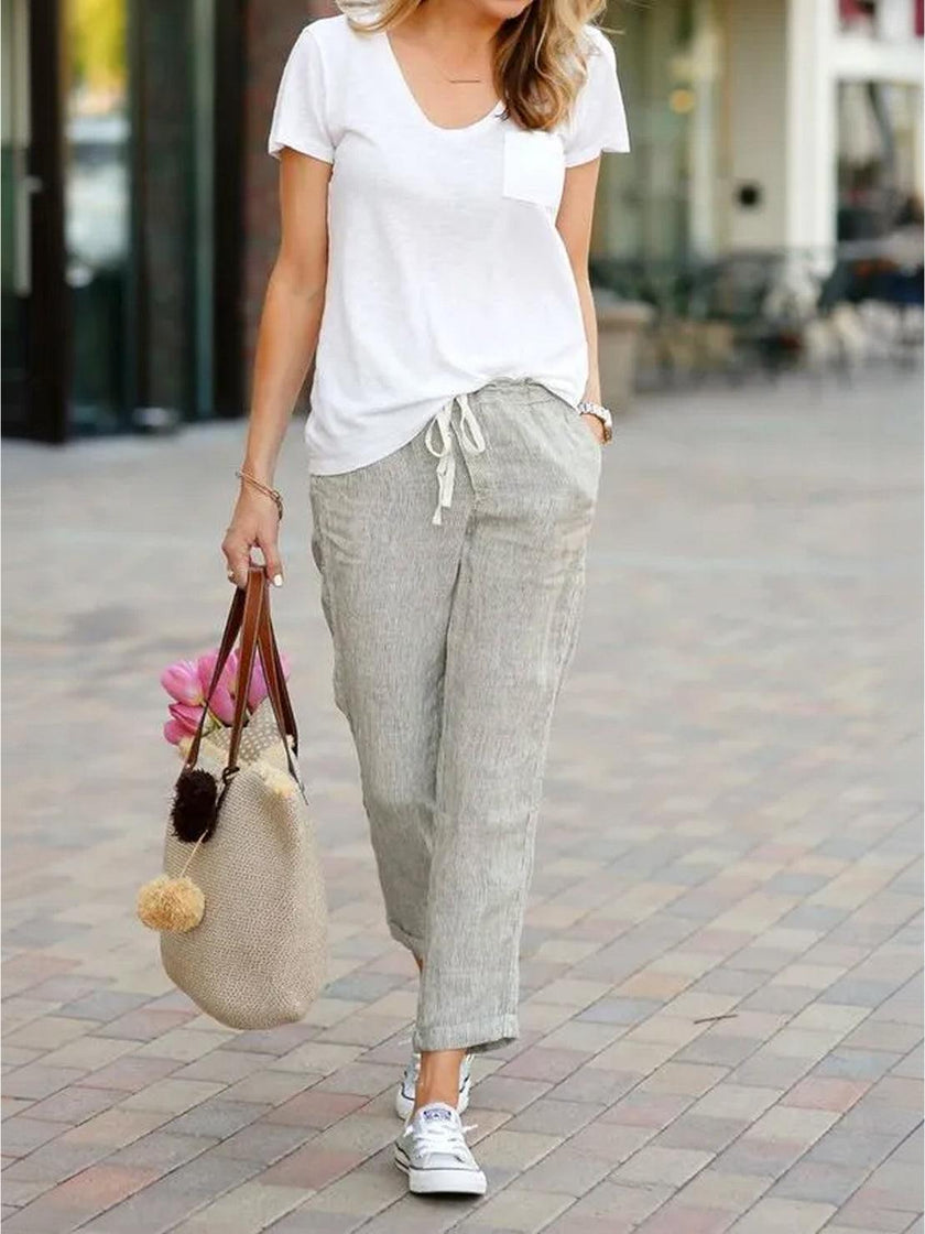 FJØRNA women's lightweight summer trousers with drawstring waist, breathable casual pants for warm weather.