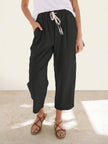 FJØRNA women's lightweight summer trousers with drawstring, breathable casual pants for warm weather.
