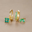 FJØRNA unisex minimalist piercing set with stainless steel hoops and studs in gold, green, and hazel, stylish and comfortable accessories for women.